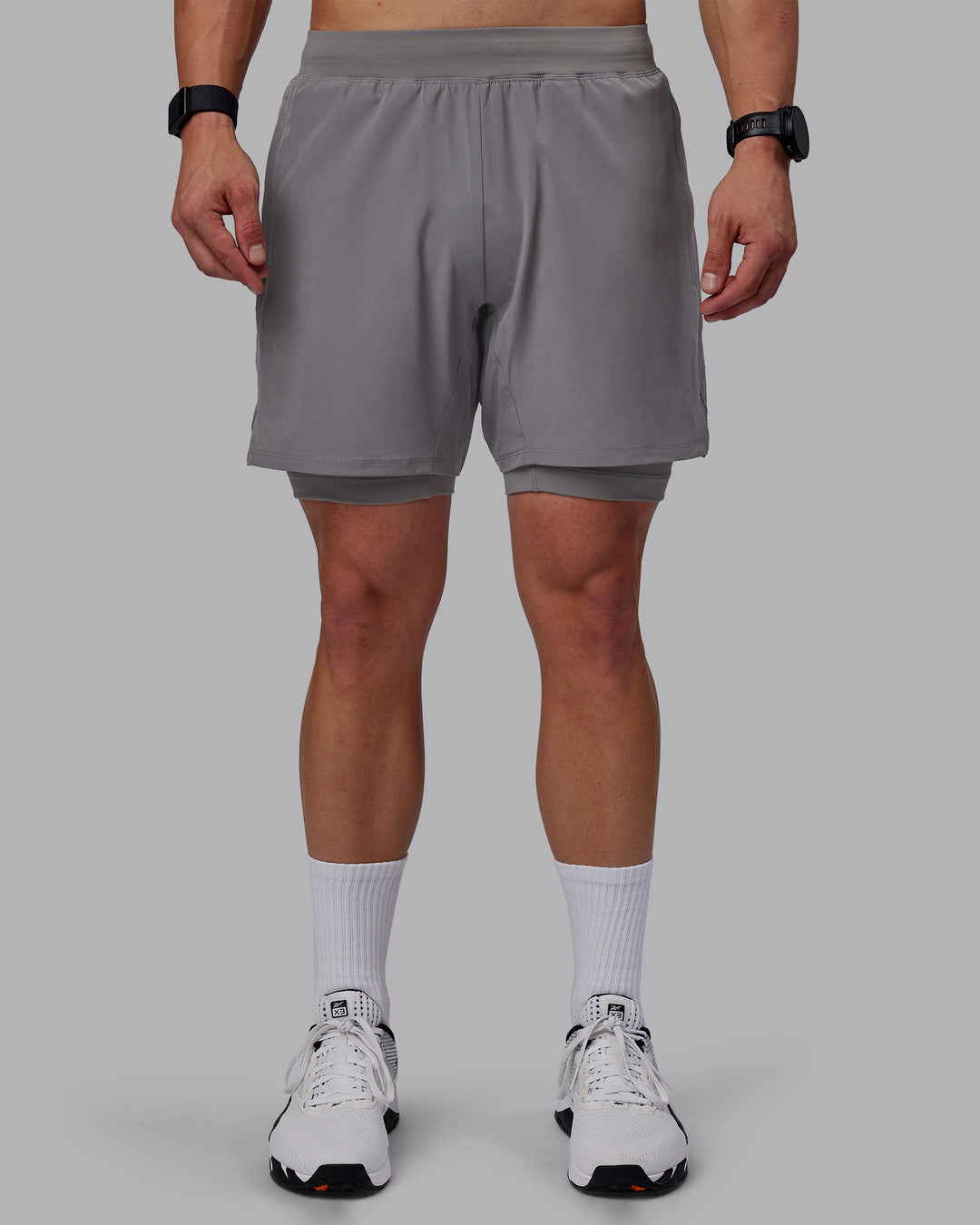 Man wearing Challenger 6&quot; Lined Performance Shorts - Storm Front