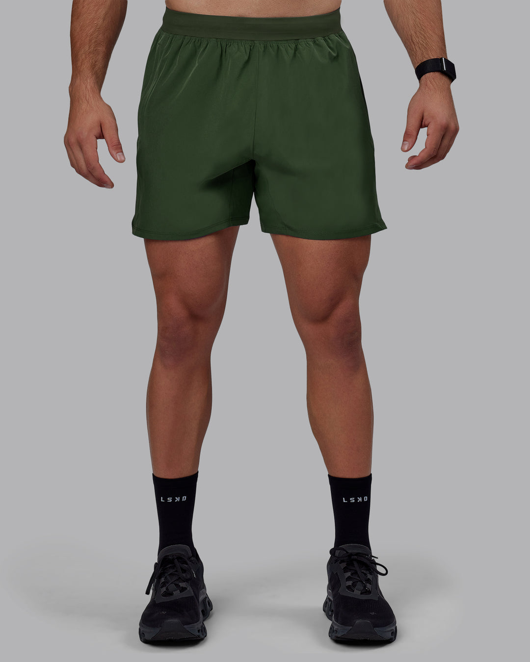 Man wearing Challenger 6&quot; Performance Shorts - Cilantro