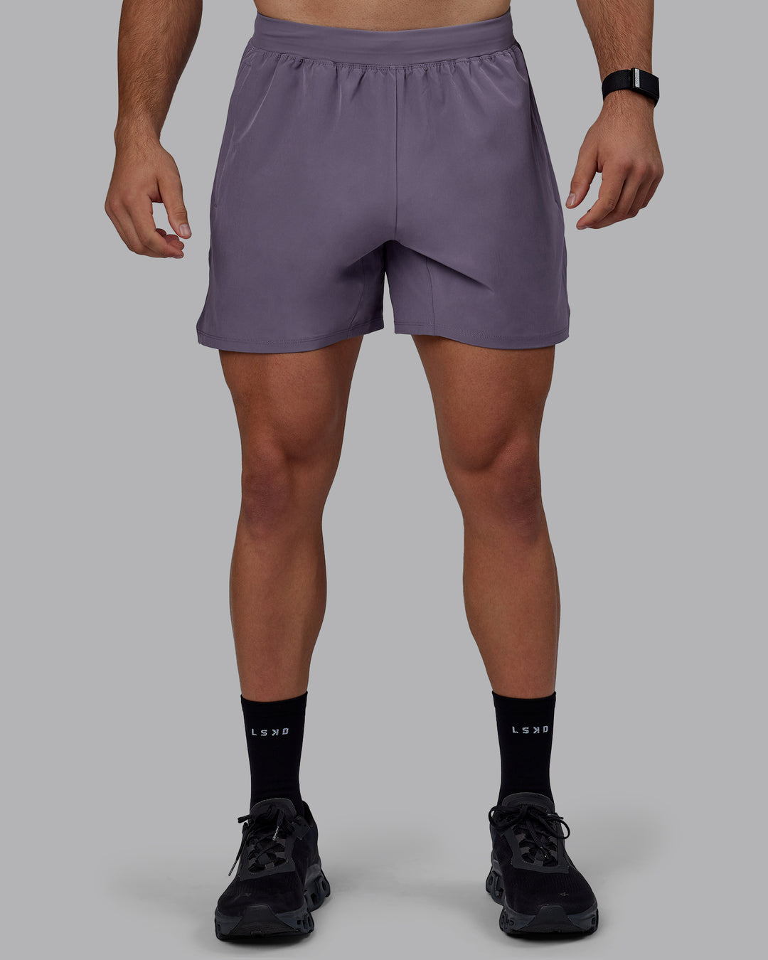 Man wearing Challenger 6&quot; Performance Shorts - Purple Sage