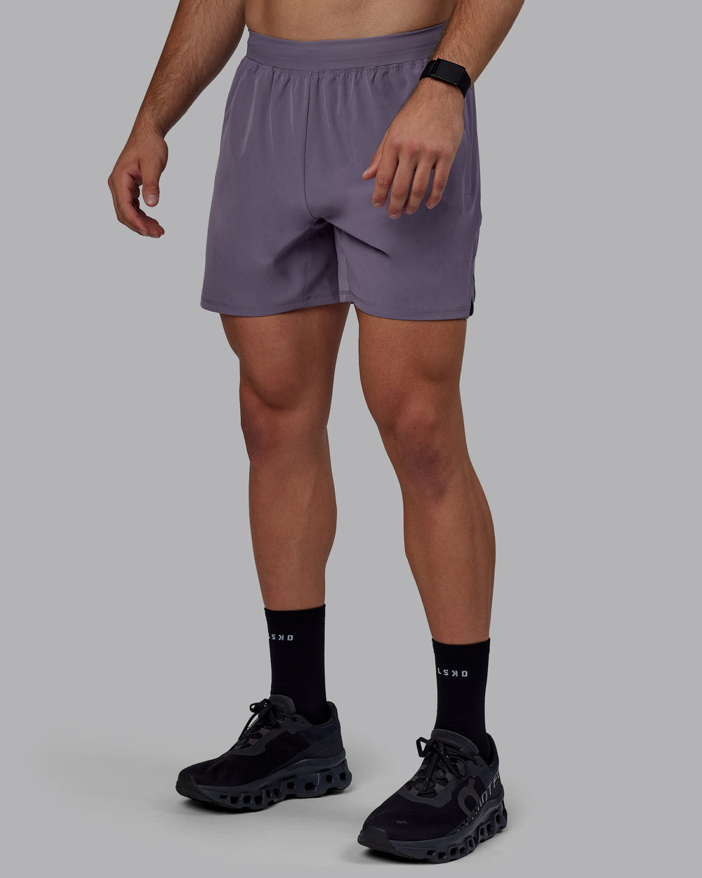 Man wearing Challenger 6" Performance Shorts - Purple Sage