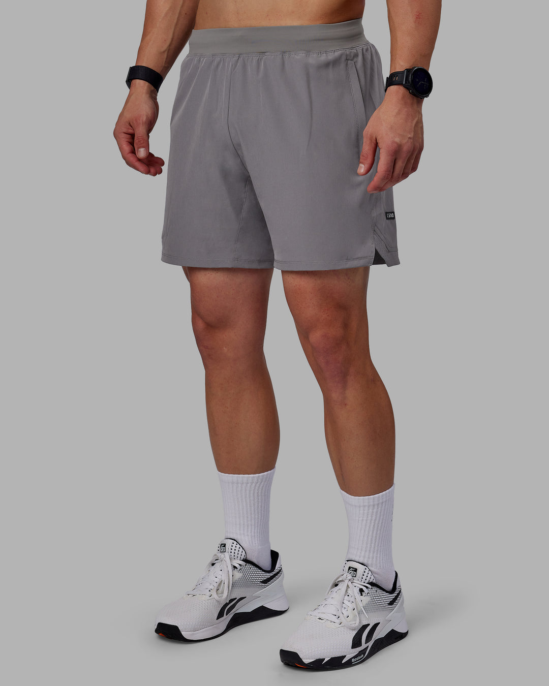 Man wearing Challenger 6&quot; Performance Shorts - Storm Front