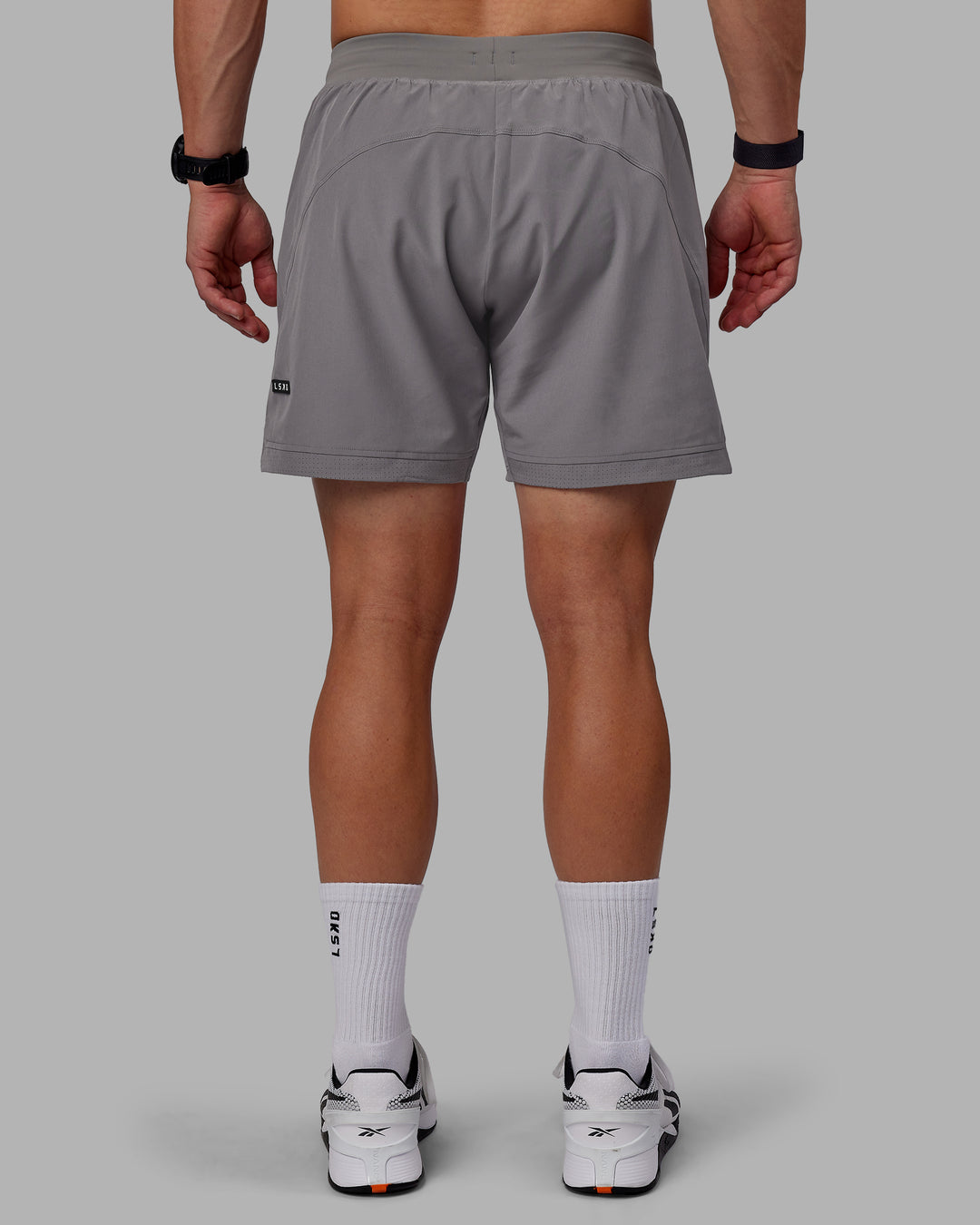 Man wearing Challenger 6&quot; Performance Shorts - Storm Front