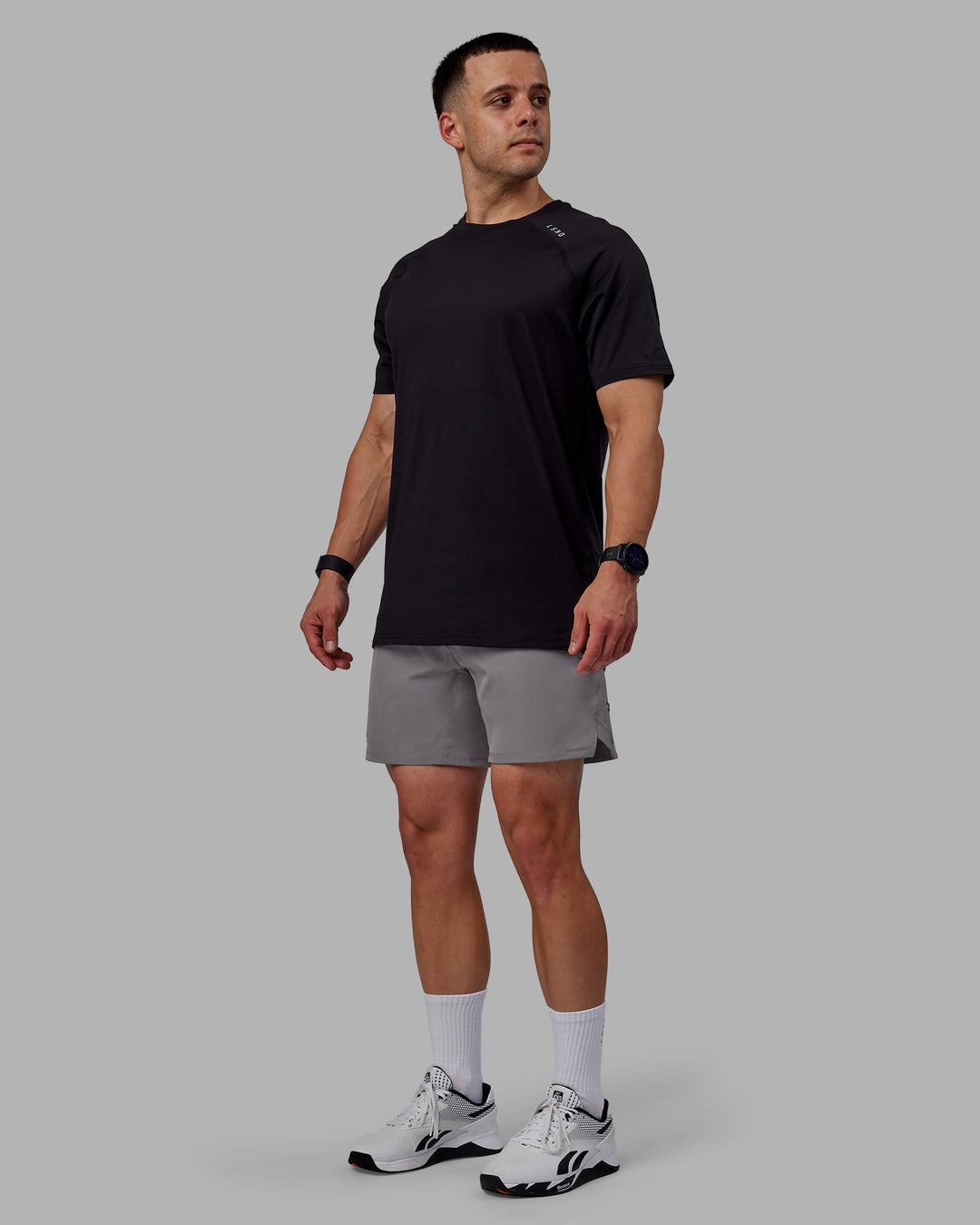 Man wearing Challenger 6&quot; Performance Shorts - Storm Front