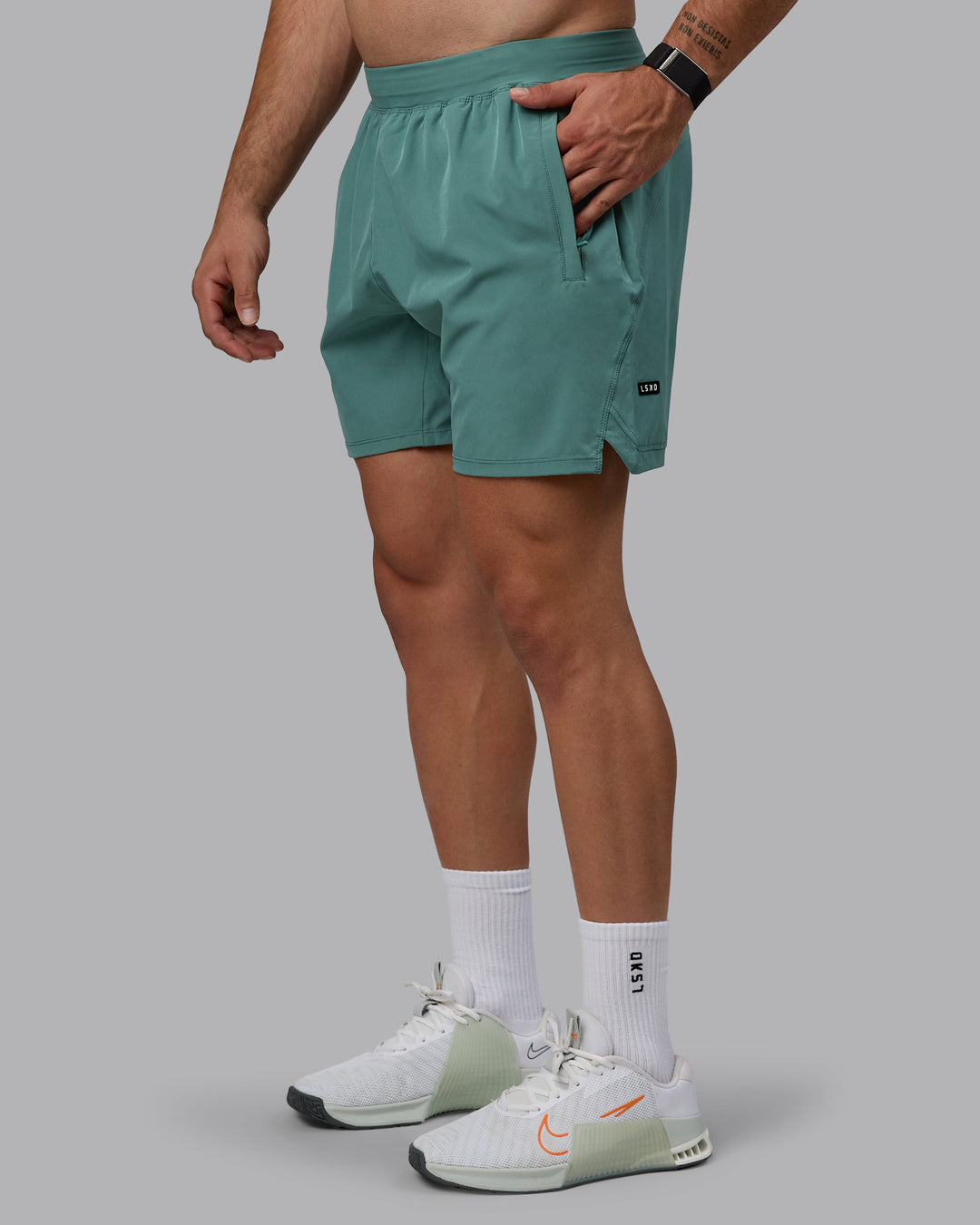 Man wearing Challenger 6&quot; Performance Shorts - Sagebrush