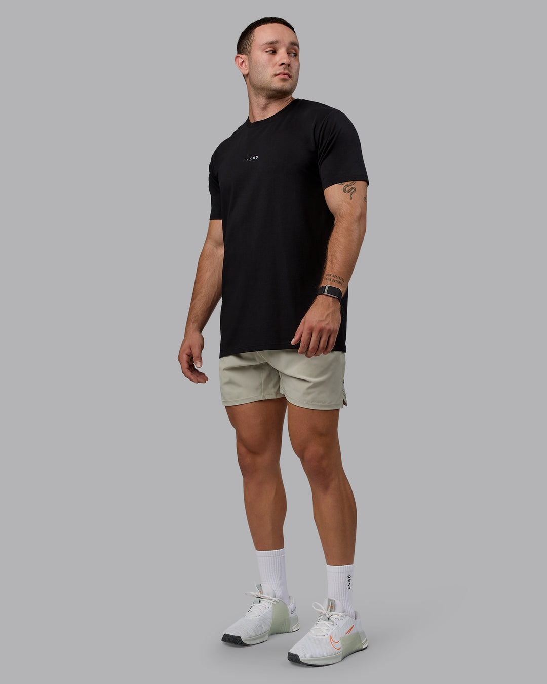 Man wearing Challenger 6&quot; Performance Shorts - Sustained Grey