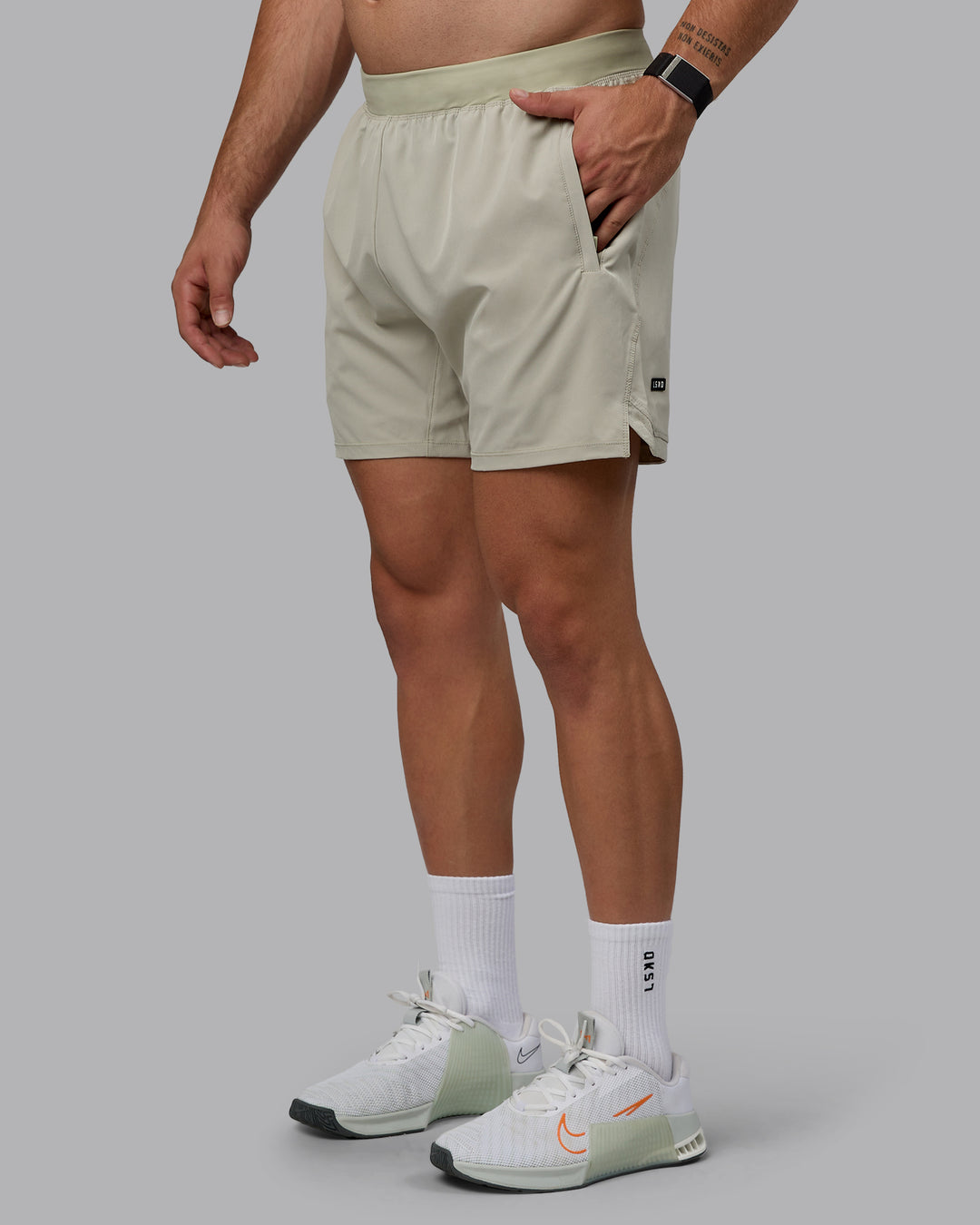 Man wearing Challenger 6&quot; Performance Shorts - Sustained Grey