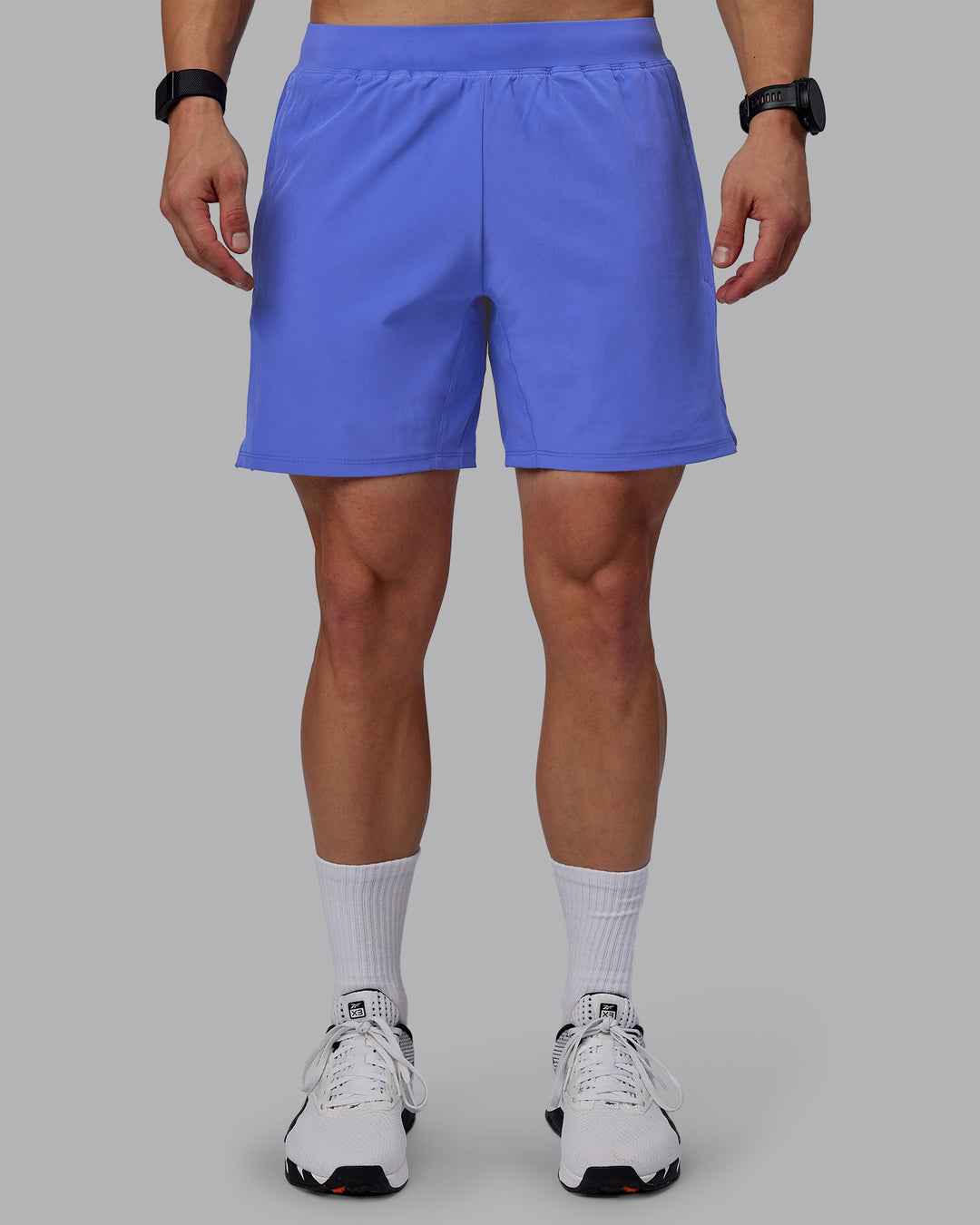 Man wearing Challenger 6&quot; Performance Shorts - Baja Blue