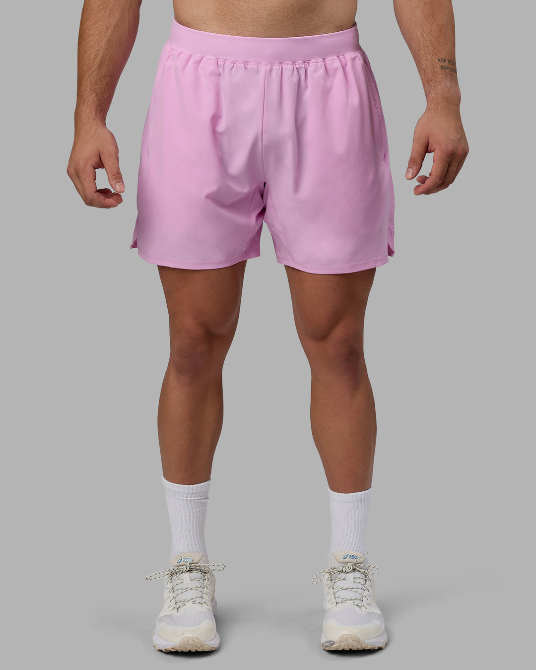 Man wearing Challenger 6&quot; Performance Shorts - Pastel Orchid