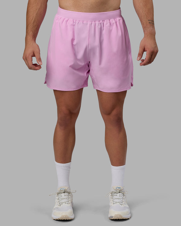 Man wearing Challenger 6" Performance Shorts - Pastel Orchid