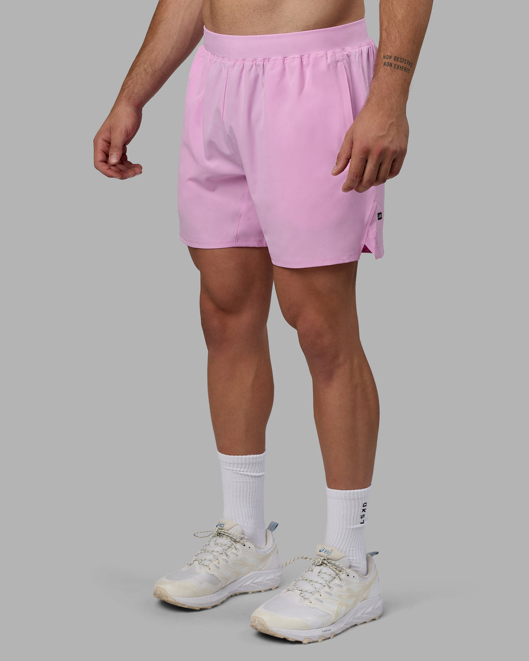 Man wearing Challenger 6&quot; Performance Shorts - Pastel Orchid