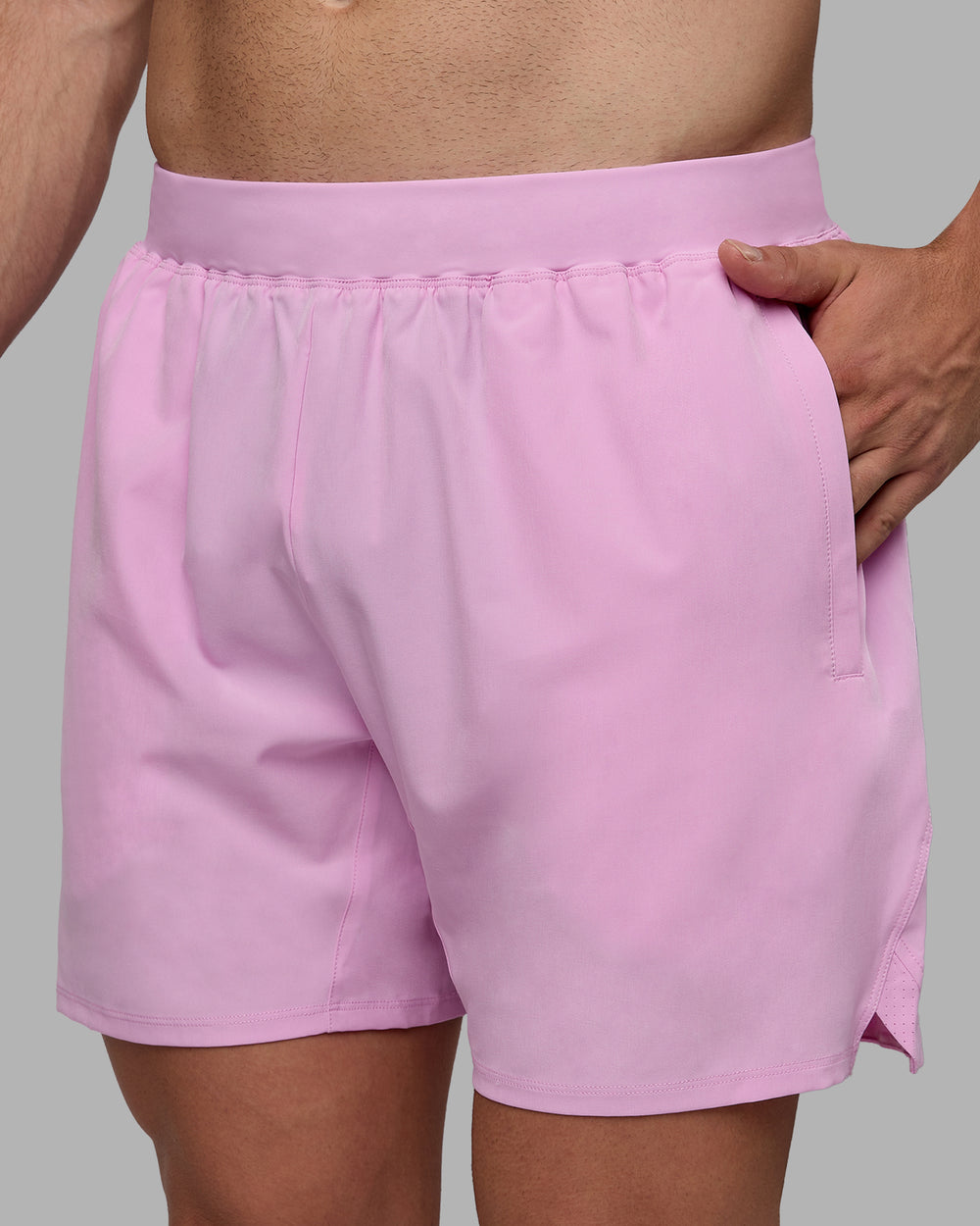 Man wearing Challenger 6" Performance Shorts - Pastel Orchid