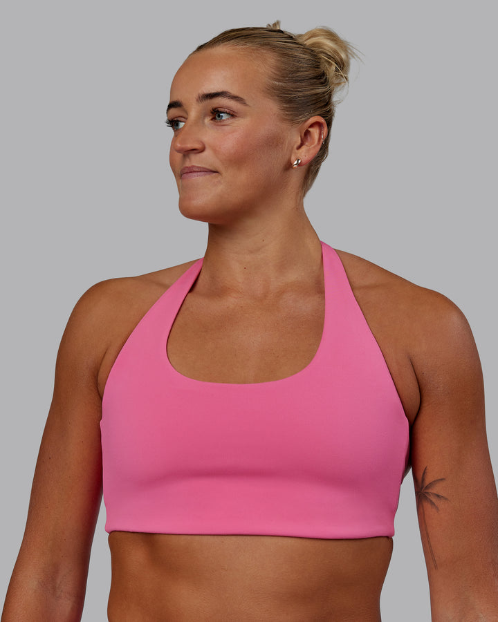 Woman wearing Challenger Sports Bra - Carmine Rose
