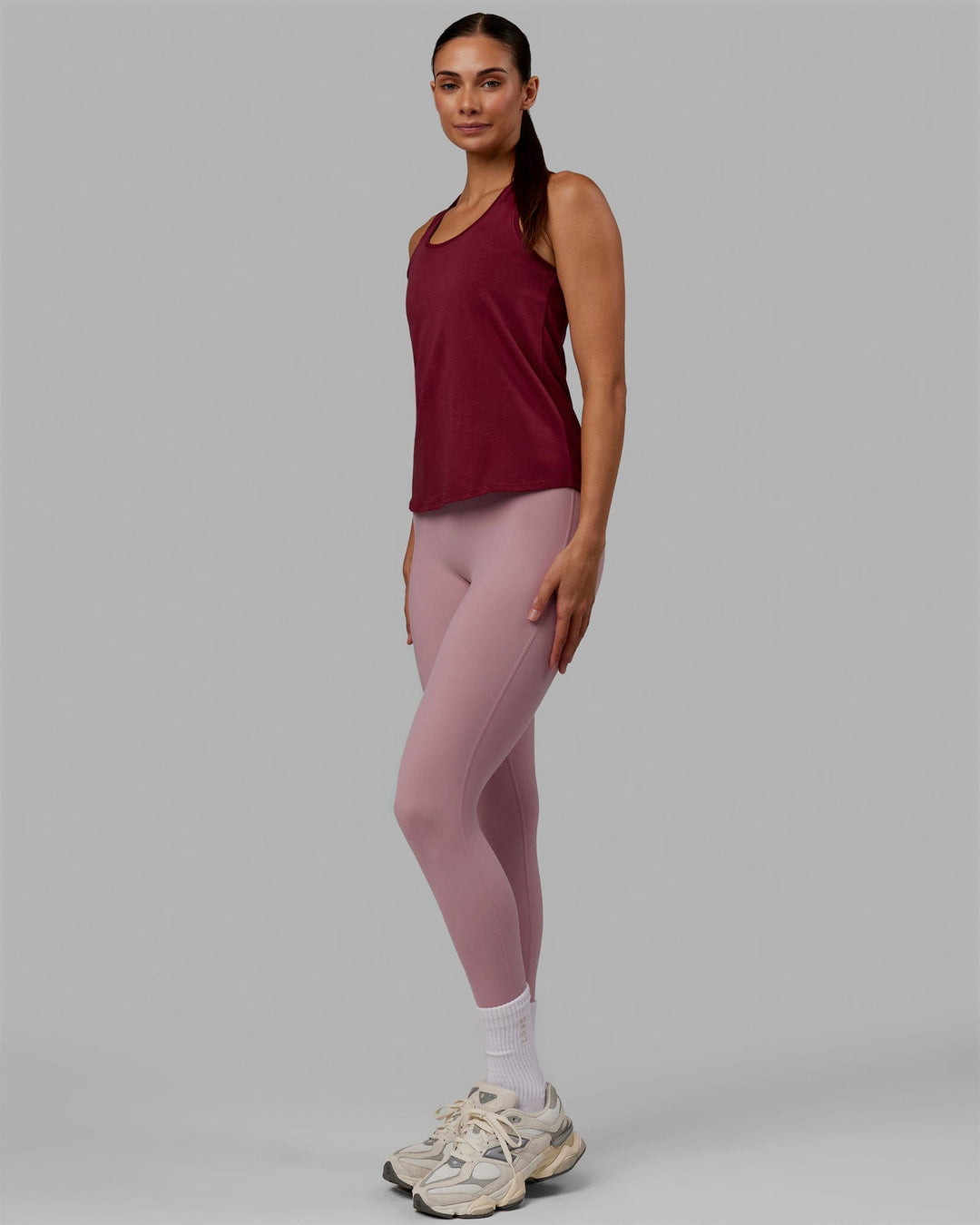 Woman wearing Charge PimaFLX-Lite Active Tank - Cranberry