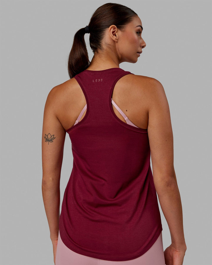 Woman wearing Charge PimaFLX-Lite Active Tank - Cranberry
