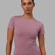 Woman wearing Charge PimaFLX-Lite Fitted Tee - Cosmetic Pink