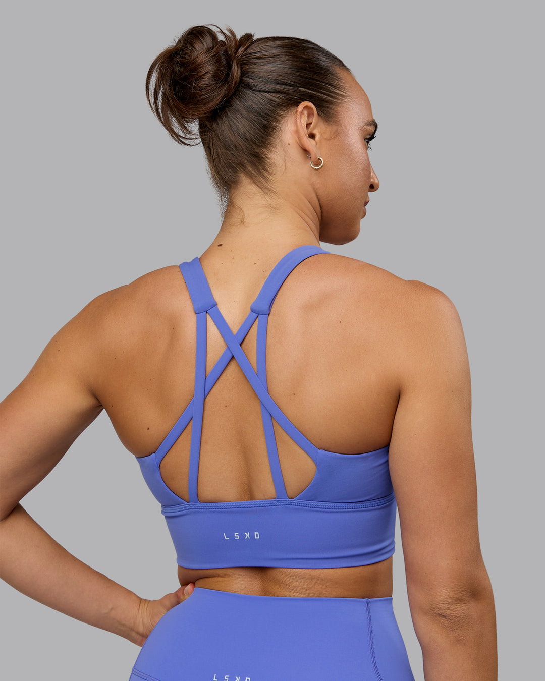 Woman wearing Circuit Sports Bra - Baja Blue