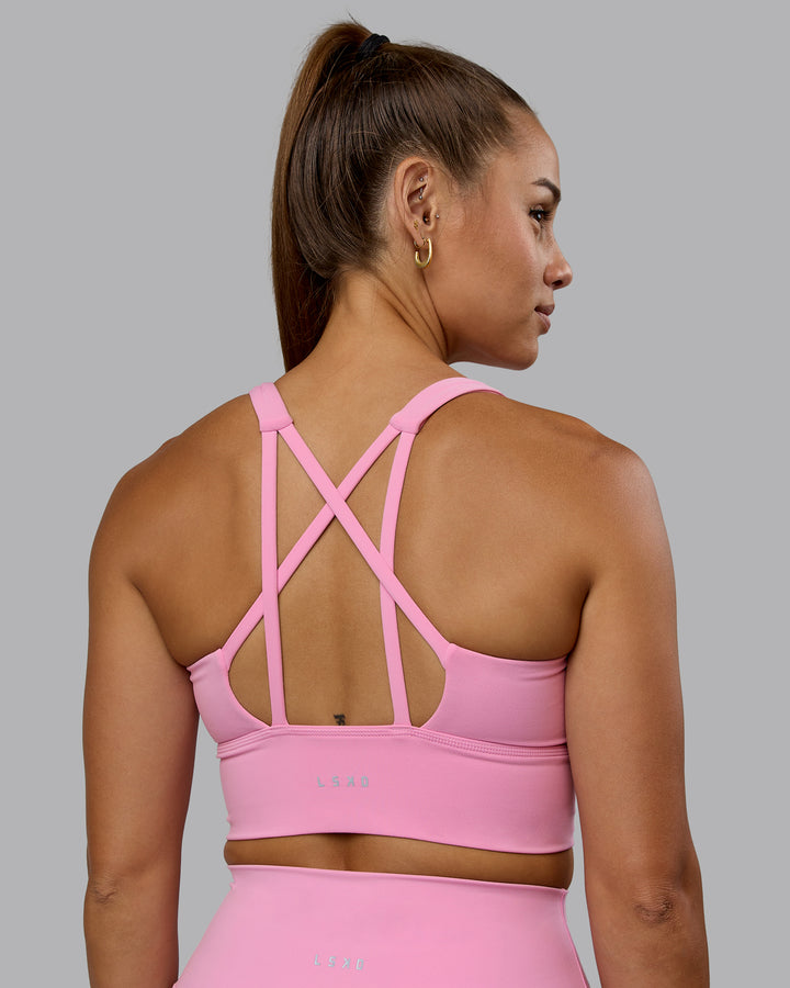 Woman wearing Circuit Sports Bra - Bubblegum
