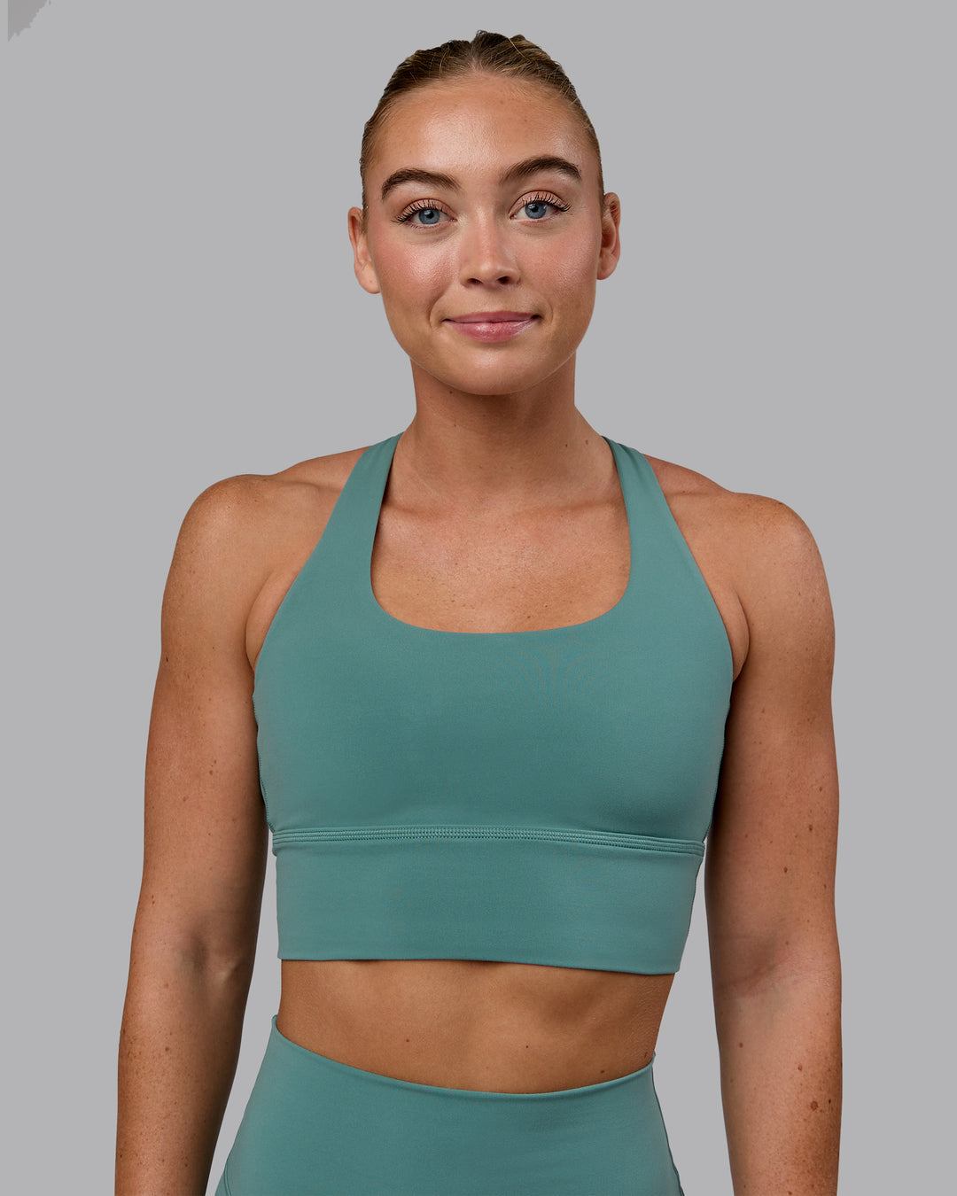 Woman wearing Circuit Sports Bra - Sagebrush