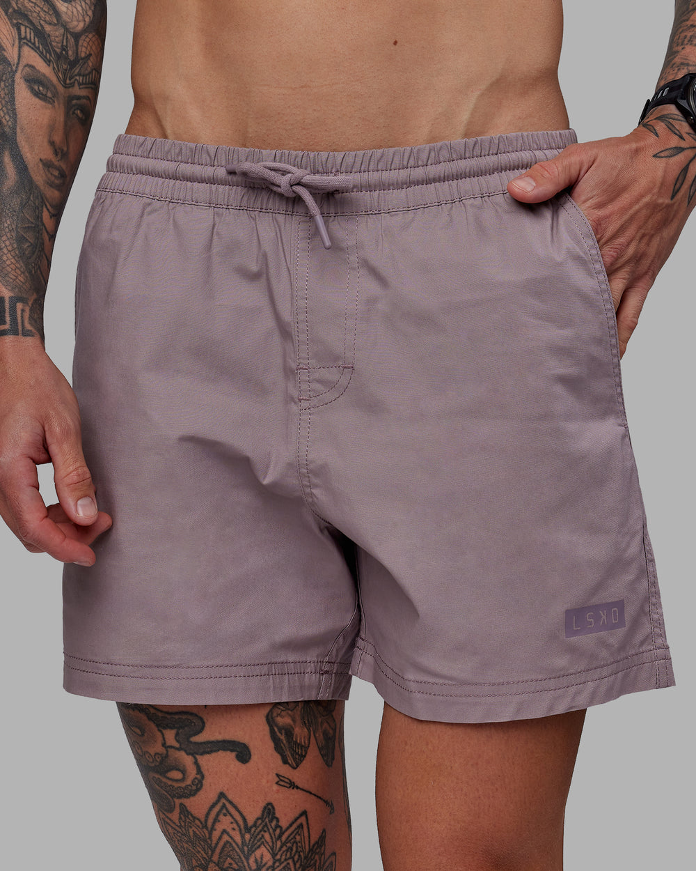 Man wearing Daily 5" Shorts - Grey Purple