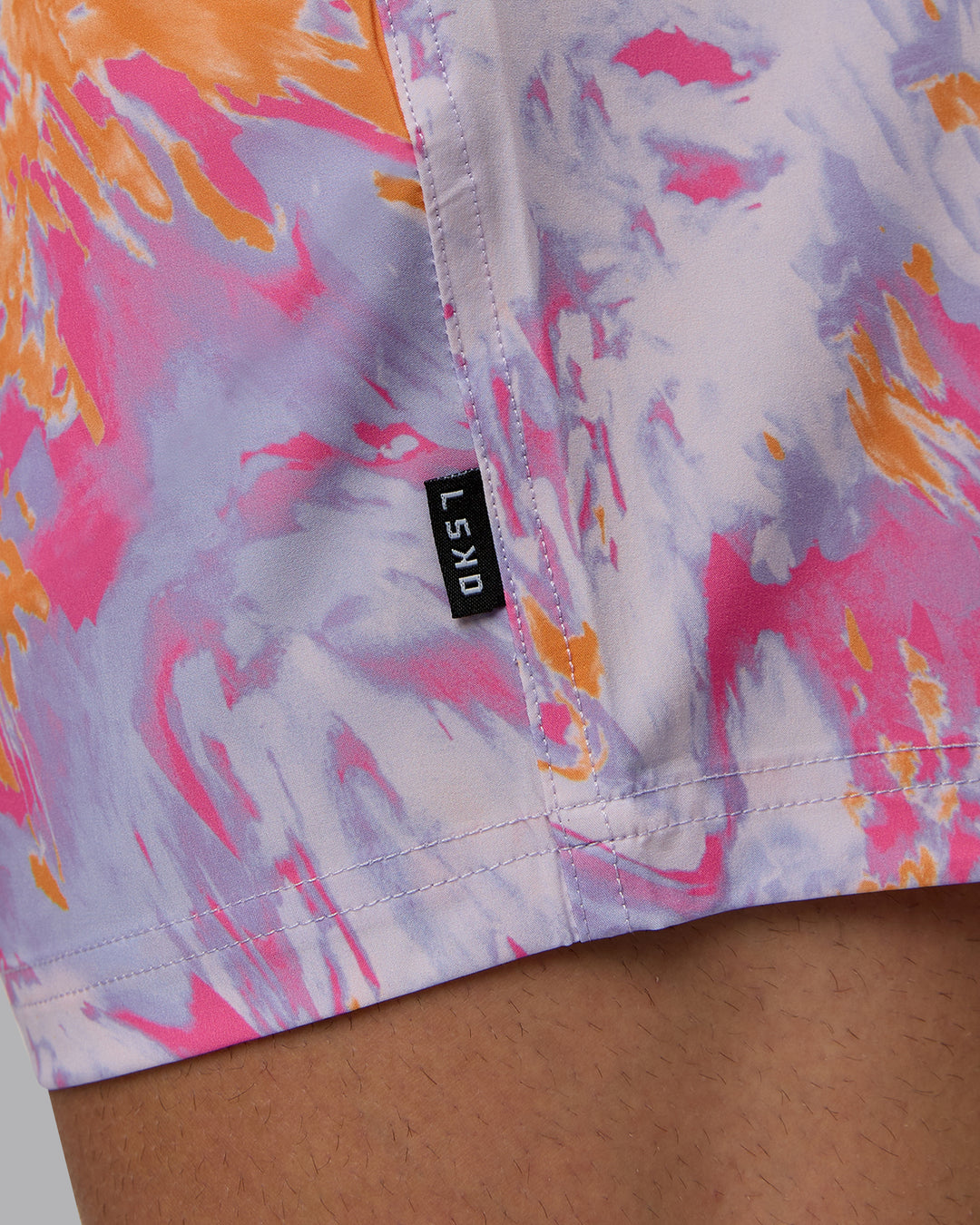 Man wearing Daily 5&quot; Swim Shorts - React Pink-Orange