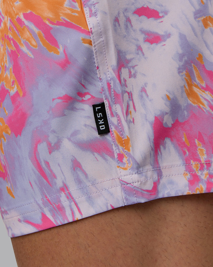 Man wearing Daily 5&quot; Swim Shorts - React Pink-Orange
