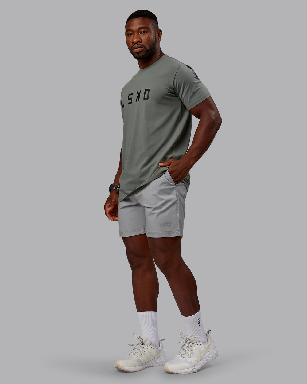 Man wearing Daily 7" Shorts - Circular Grey