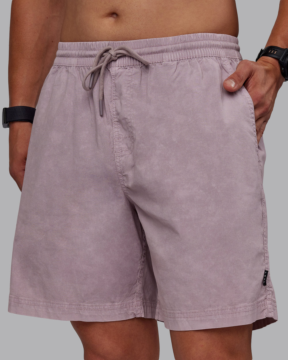 Man wearing Washed Daily 7" Shorts - Greyish Purple