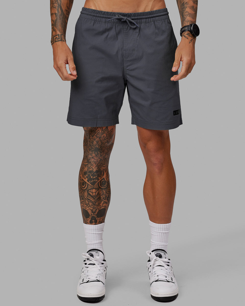 Man wearing Daily 7" Shorts - Dark Storm