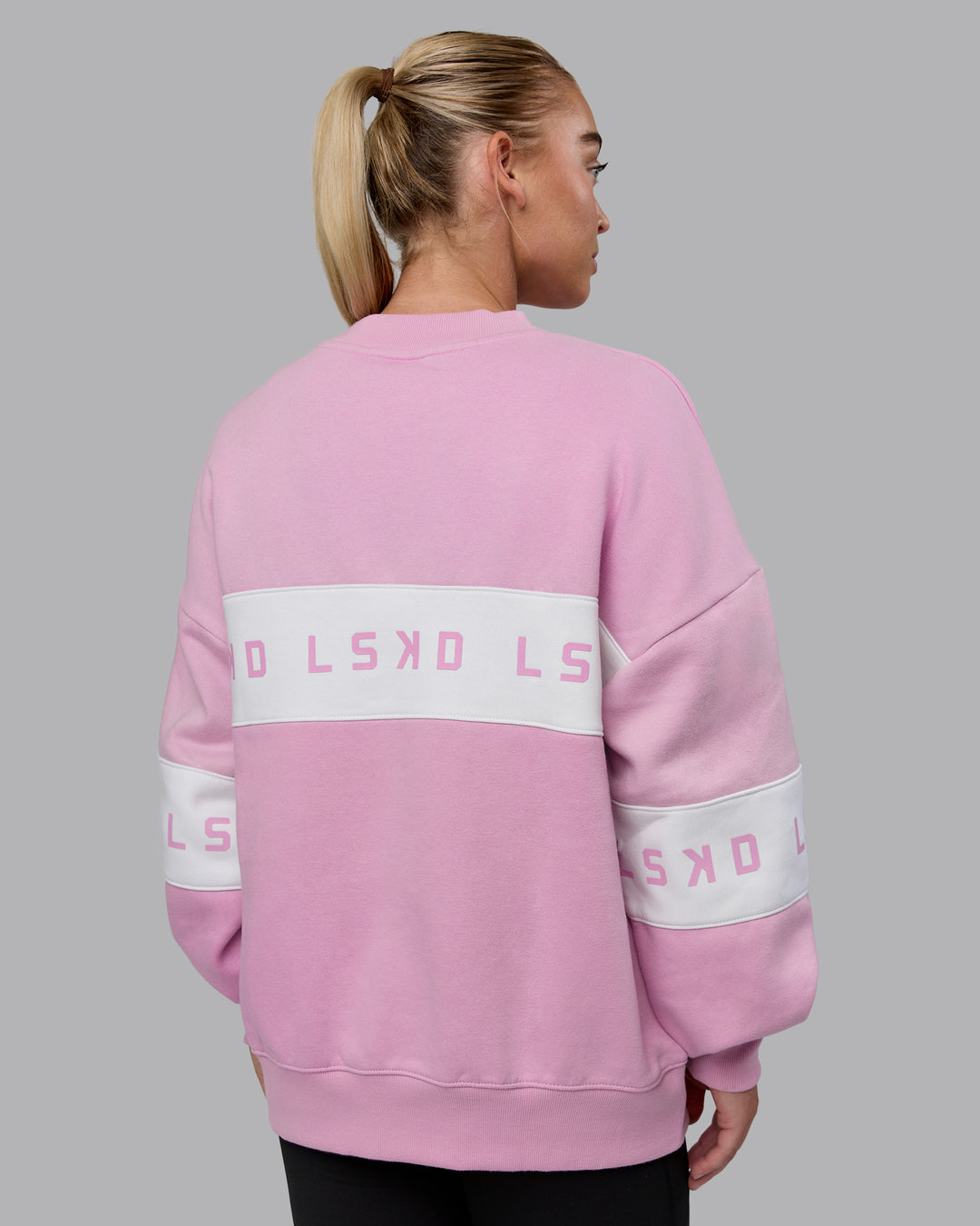 Woman wearing Disc Oversized Sweater - Bubblegum-Light Bubblegum