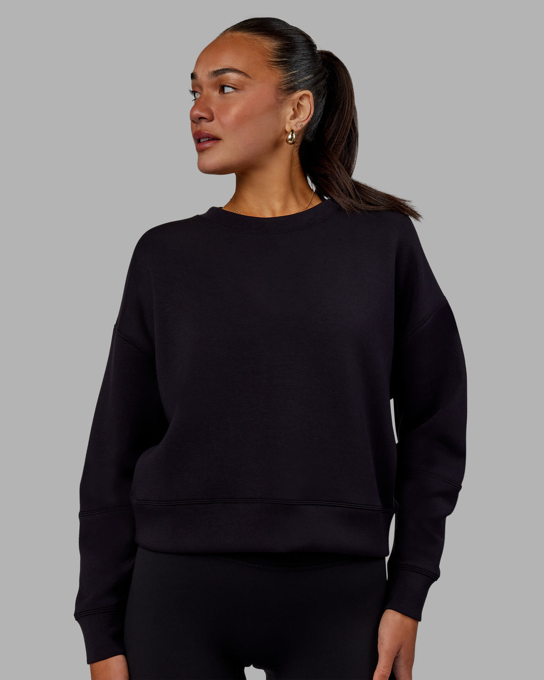 Woman wearing Elevate SoftTouch Crew Neck Sweater - Black-Blac