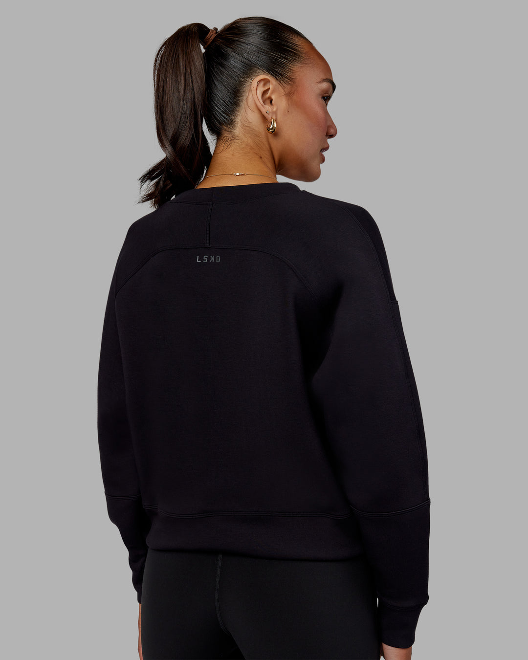 Woman wearing Elevate SoftTouch Crew Neck Sweater - Black-Blac