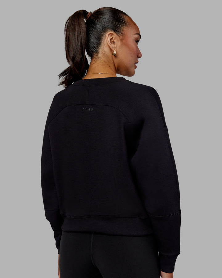 Woman wearing Elevate SoftTouch Crew Neck Sweater - Black-Blac
