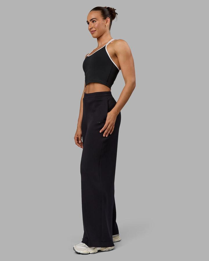 Woman wearing Elevate SoftTouch Wide Leg Pants - Black-Black
