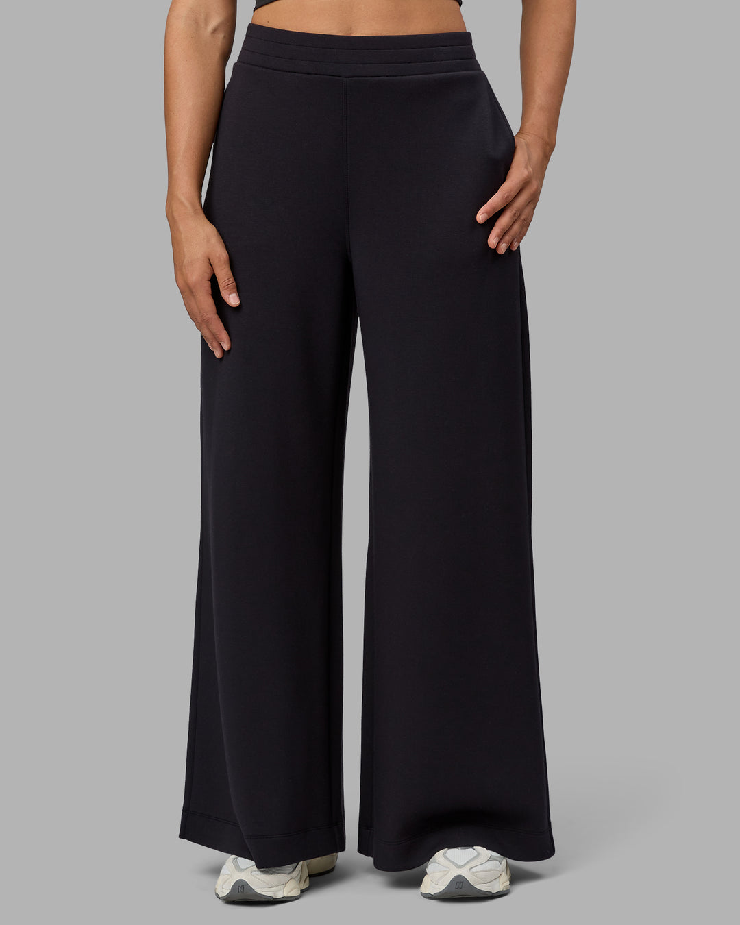 Woman wearing Elevate SoftTouch Wide Leg Pants - Black-Black