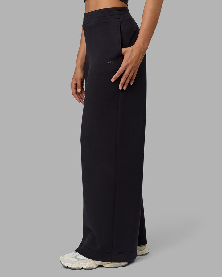 Woman wearing Elevate SoftTouch Wide Leg Pants - Black-Black
