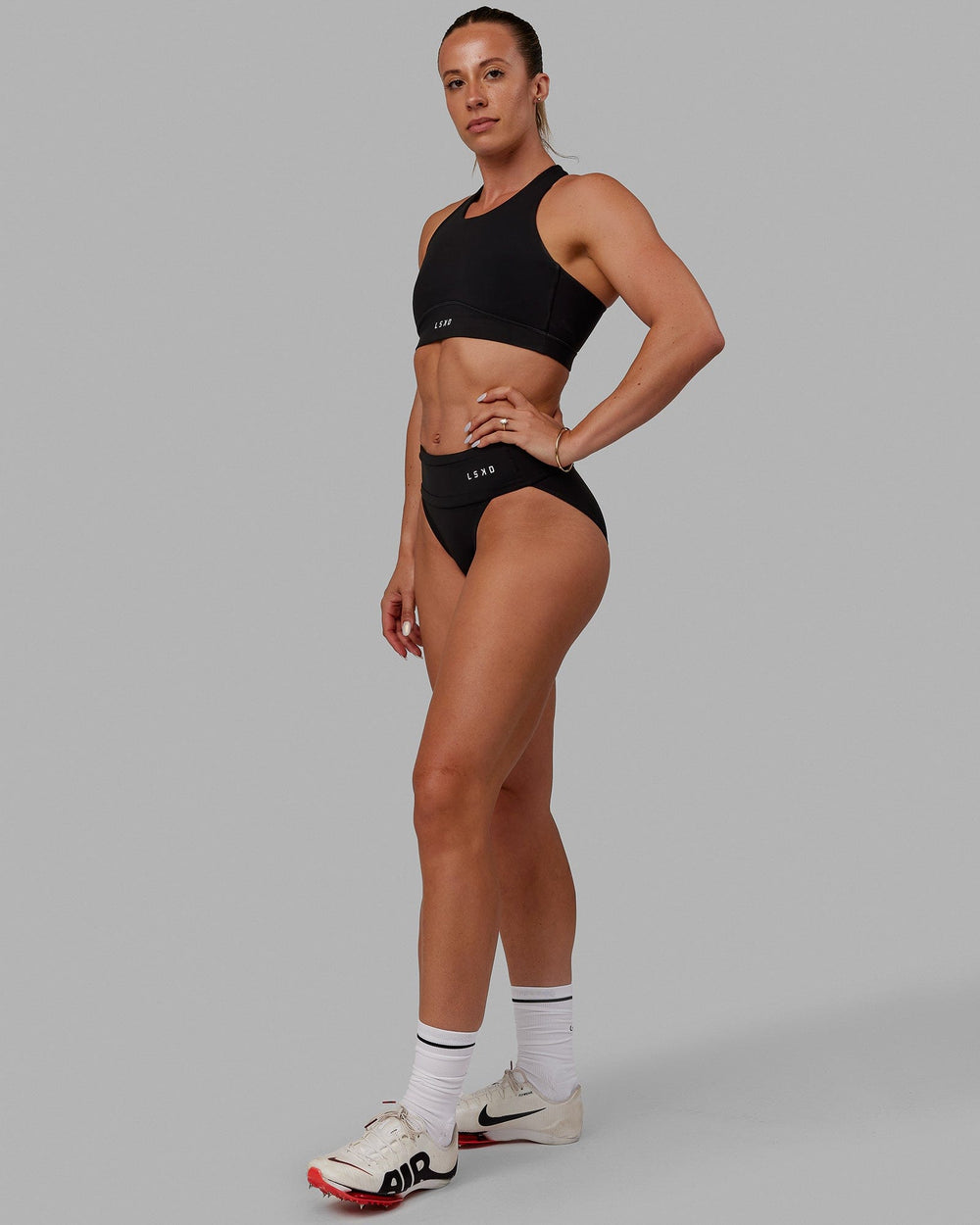 Woman wearing Elevate Sprinting Briefs - Black-White