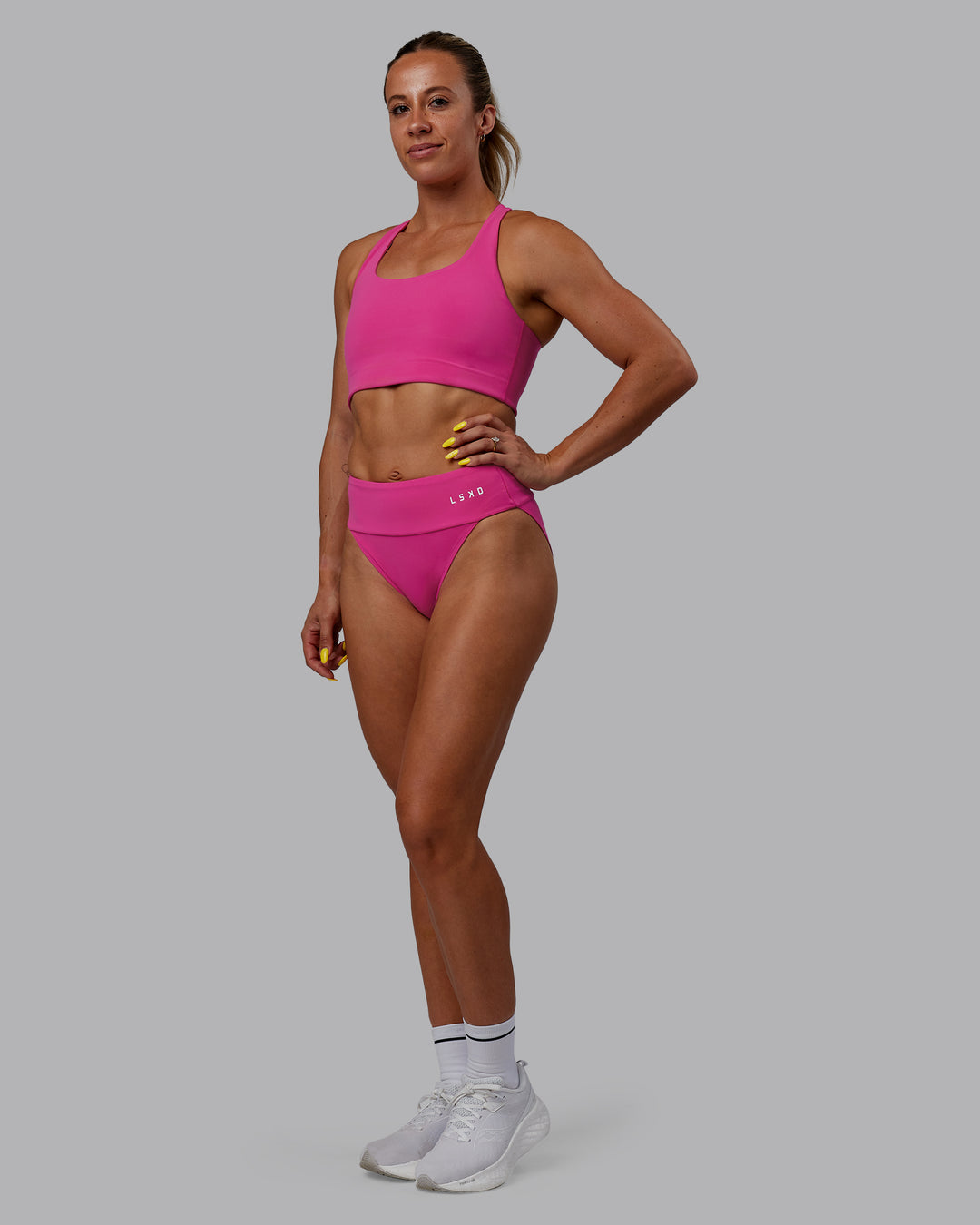 Woman wearing Elevate Sprinting Briefs - Fuchsia Pink