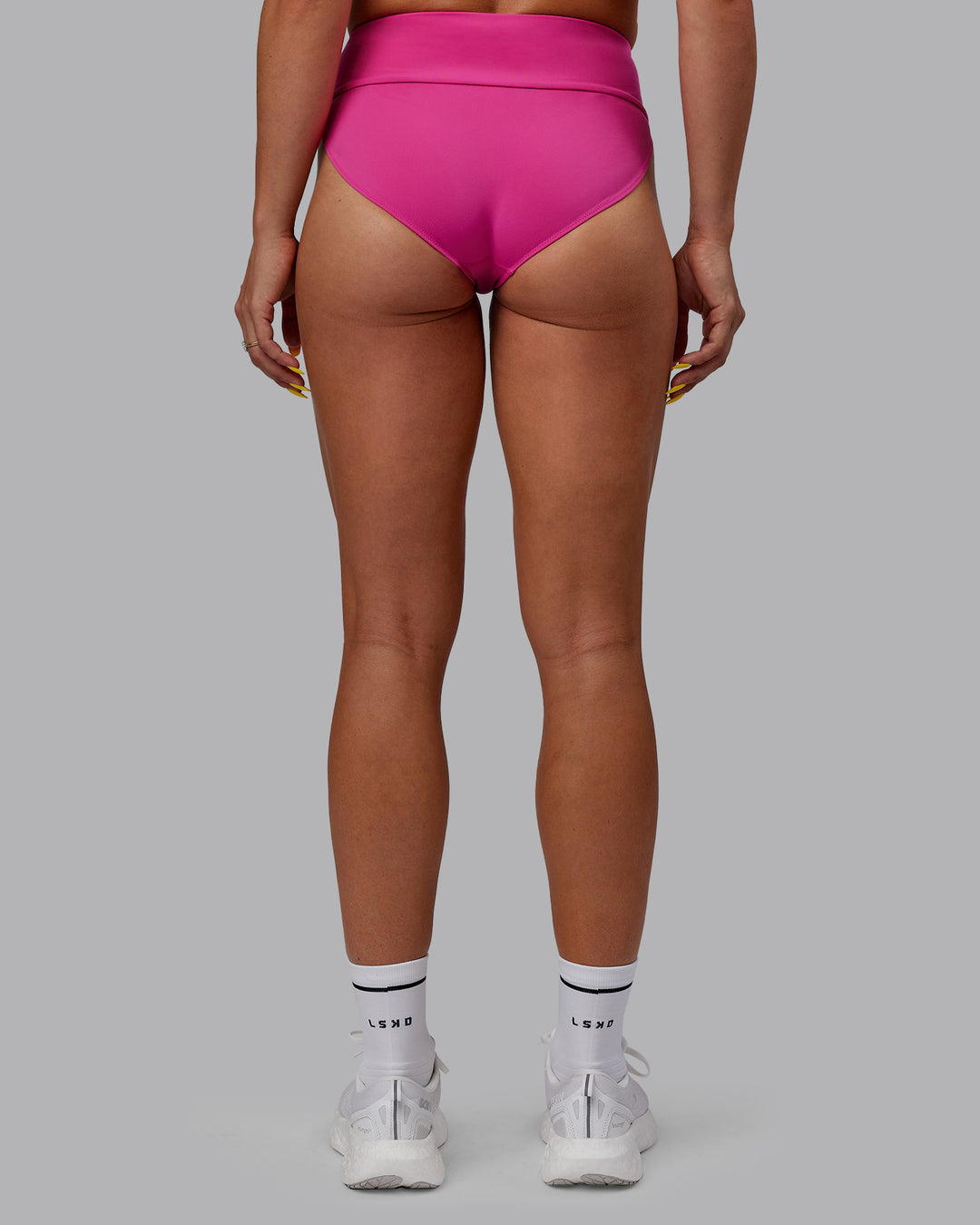 Woman wearing Elevate Sprinting Briefs - Fuchsia Pink