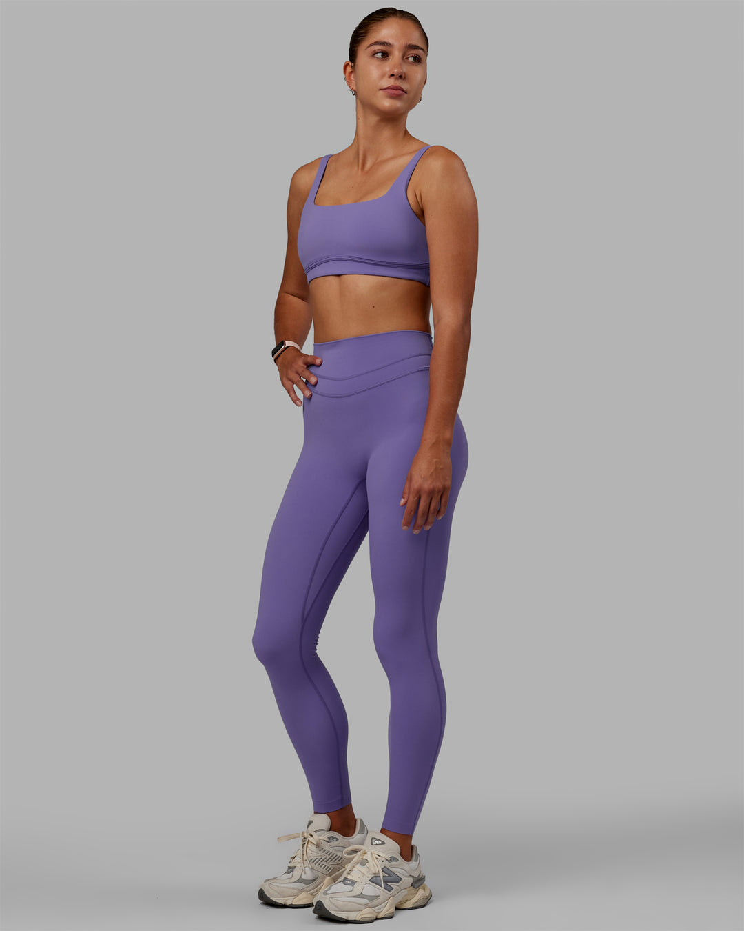 Woman wearing Elevation Sports Bra - Dahlia Purple