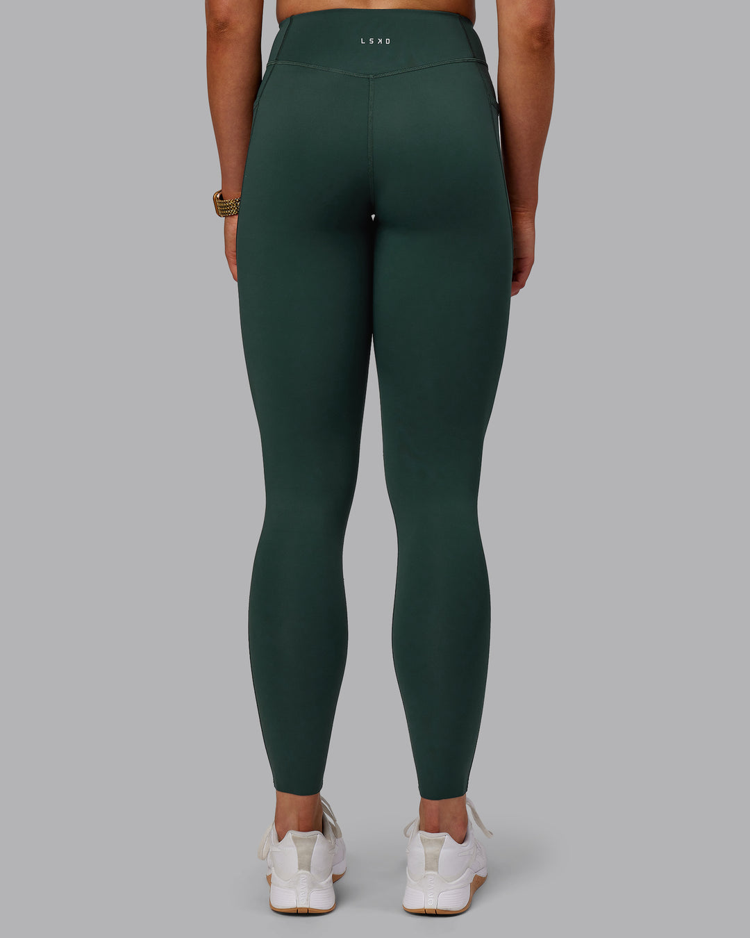 Woman wearing Elite Full Length Leggings - Vital Green