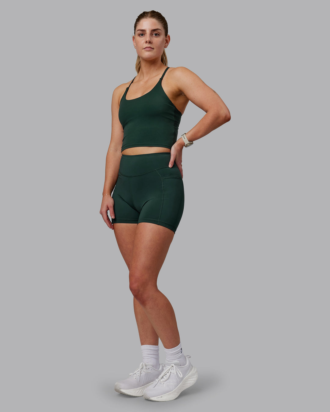 Woman wearing Elite X-Shorts - Vital Green