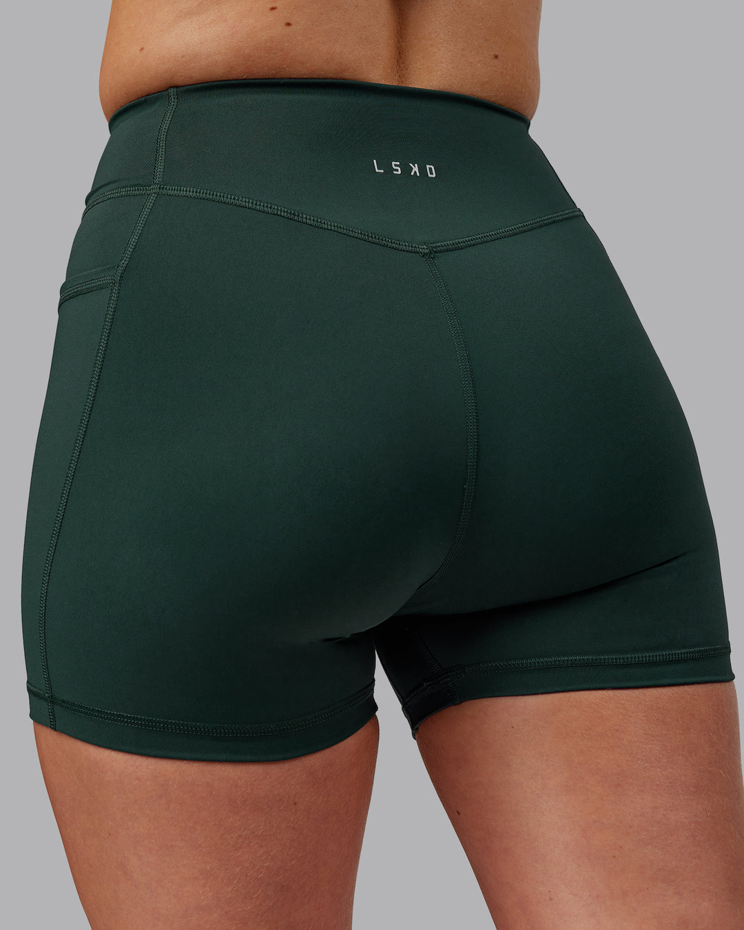 Woman wearing Elite X-Shorts - Vital Green