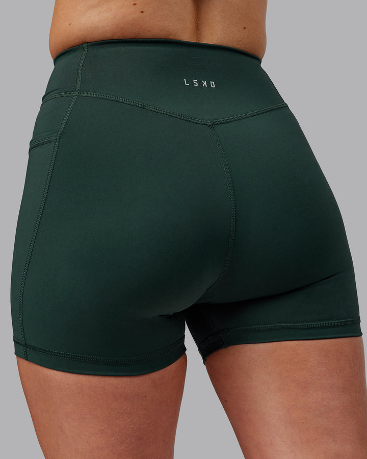 Woman wearing Elite X-Shorts - Vital Green
