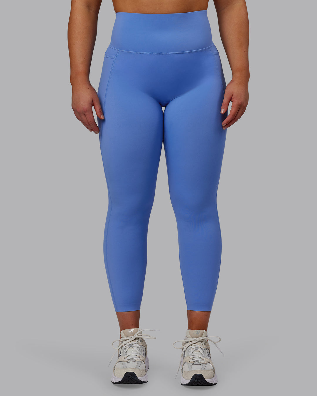 Woman wearing Elixir 7/8 Length Tights With Pockets - Ultramarine