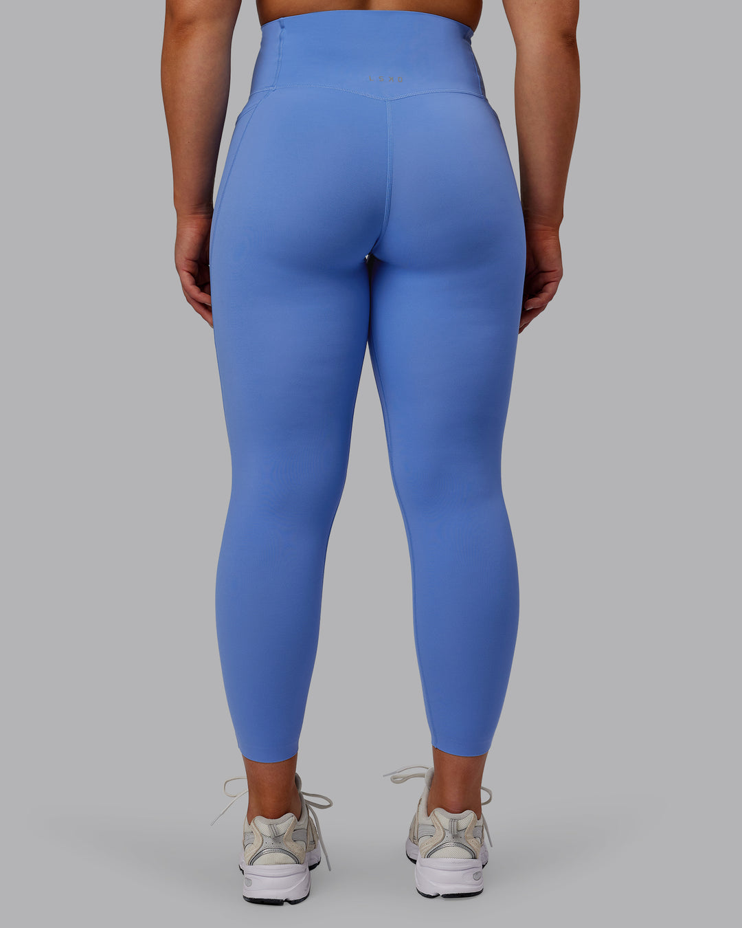 Woman wearing Elixir 7/8 Length Tights With Pockets - Ultramarine