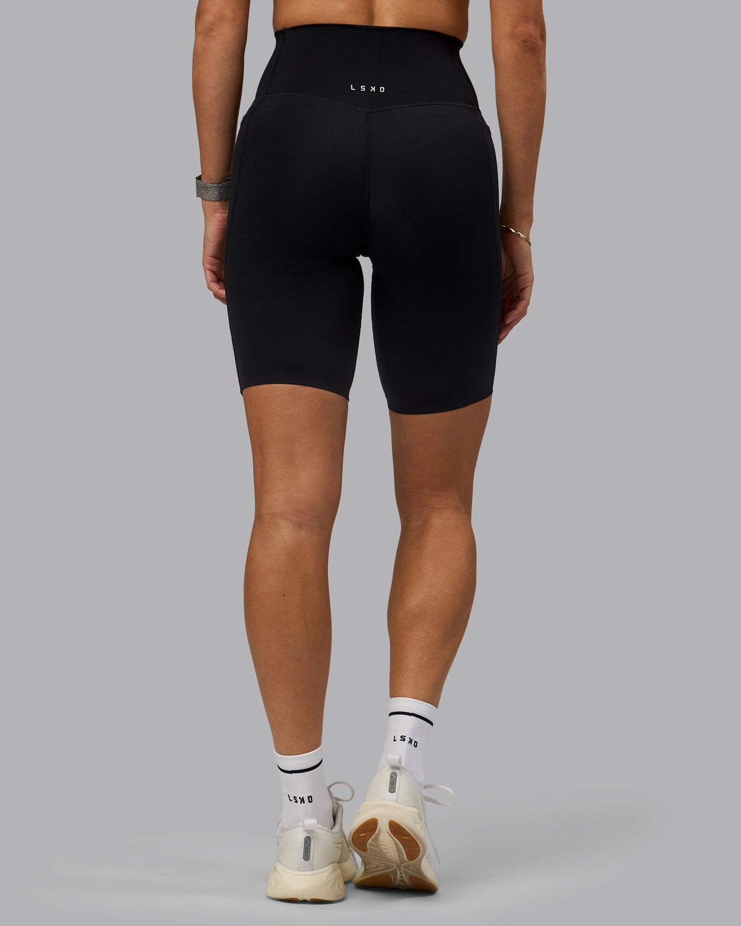 Woman wearing Elixir Bike Shorts With Pockets - Black