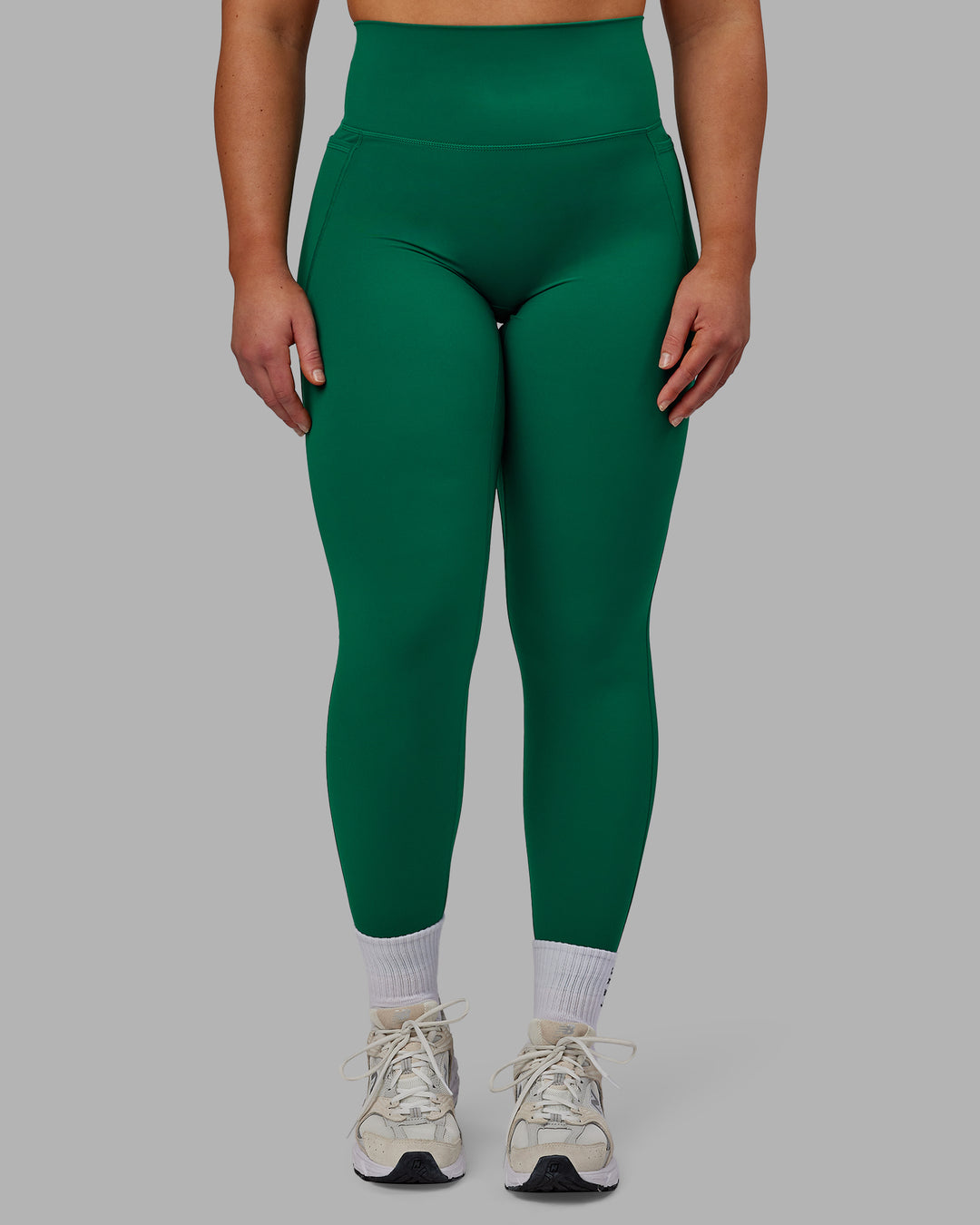 Woman wearing Elixir Full Length Tights With Pockets - Malachite