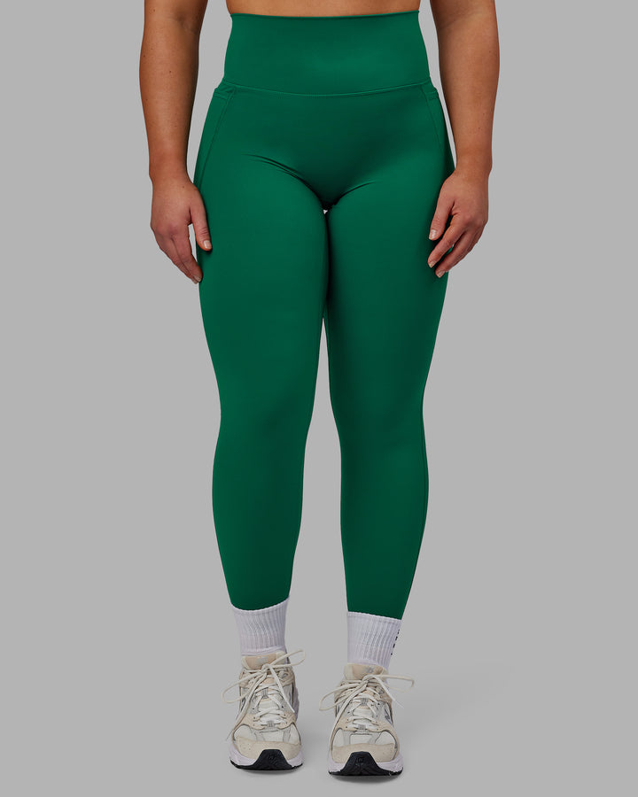 Woman wearing Elixir Full Length Tights With Pockets - Malachite
