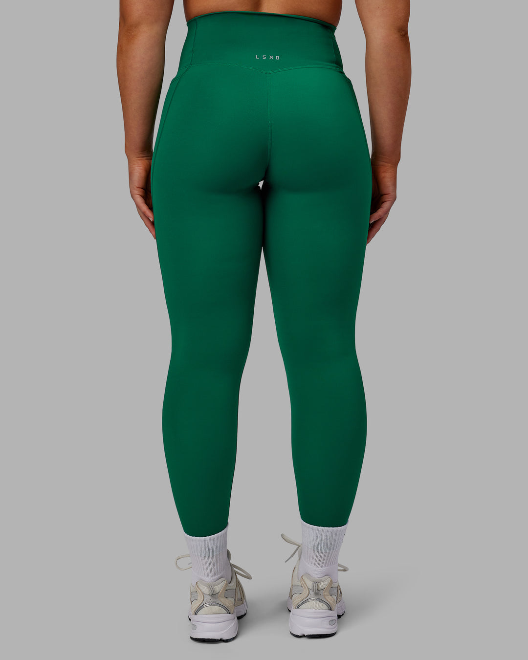 Woman wearing Elixir Full Length Tights With Pockets - Malachite