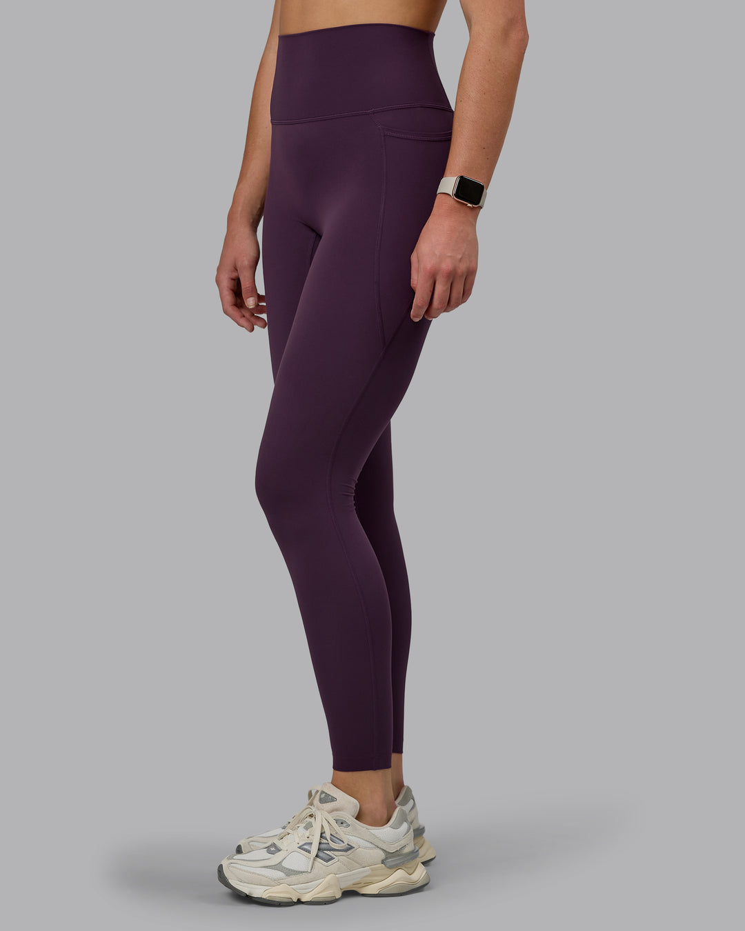 Woman wearing Elixir Full Length Tights With Pockets - Midnight Plum